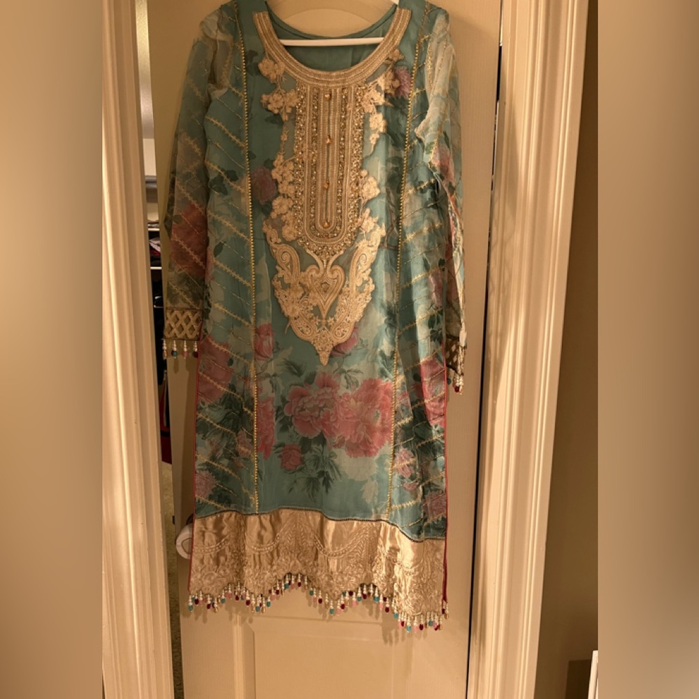 Fancy embroidered organza party wear dress…